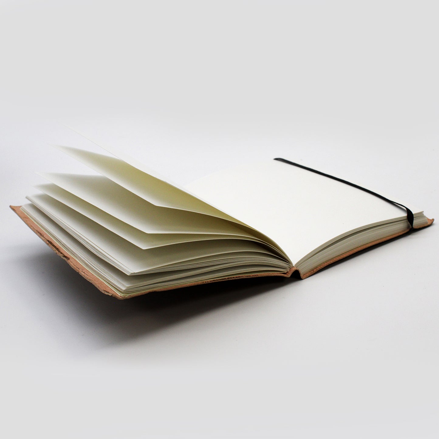 Carnets en cuir tanné avec bandoulière