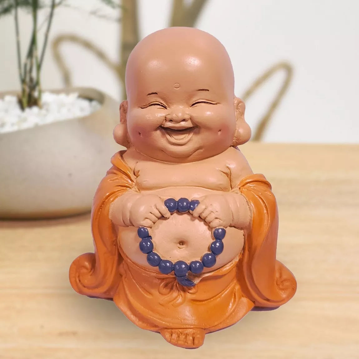 Bouddha rieur toge orange - Porte-bonheur (9x5,5x10 cm)