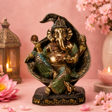 Ganesha assis sur feuille - Sagesse & Prospérité (17x14x21 cm)